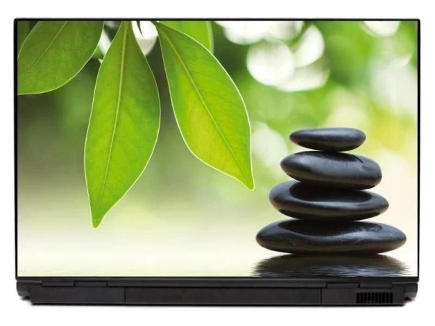 Naklejka na laptopa ogród zen 0052 - Wzór graficzny. Zielone liście i kamienie ułożone w stos na tle rozmytej zieleni