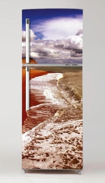 Okleina na lodówkę naklejka ocean P97 - Wzór graficzny. Grafika przedstawia plażę z falami i chmurami na niebie