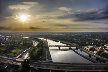 Fototapeta na ścianę zachód słońca nad miastem FP 2258 - Aranżacja w salonie. Ściany w jasnych kolorach, widok na rzekę