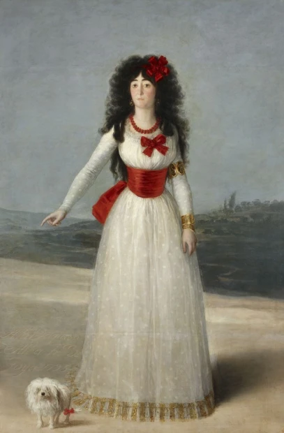 Reprodukcja obrazu Francisco Goi pod tytułem The White Duchess przedstawiająca kobietę w białej sukni z psem