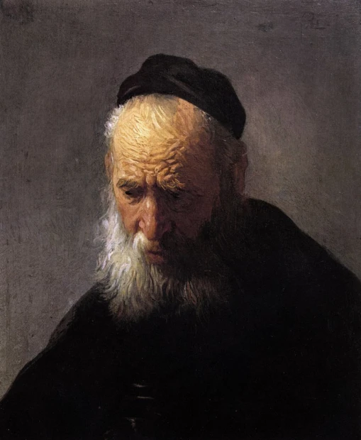 Reprodukcja Head of an old man, Rembrandt - Wzór graficzny. Obraz przedstawia starca z siwą brodą i zmarszczkami, w ciemnym