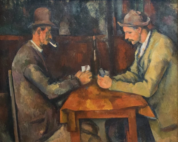 Reprodukcja Gracze w karty, Paul Cezanne - Wzór graficzny. Dwie postacie przy stole, grają w karty, z butelką w tle