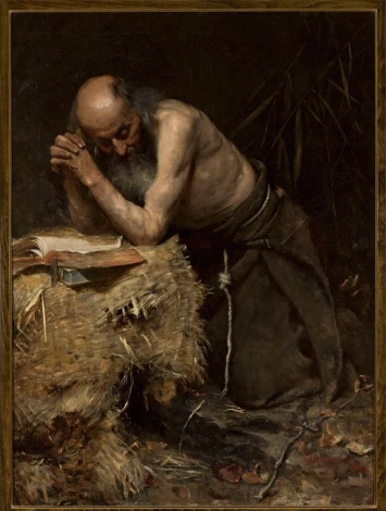 Reprodukcja The Anchorite, Teodor Axentowicz - Wzór graficzny. Mężczyzna klęczy przy stosie siana, z książką przed sobą
