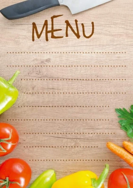 Tablica kredowa z nadrukiem menu 027 - Wzór graficzny. Na tle drewnianym widoczne są warzywa oraz napis MENU