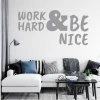 Naklejka na ścianę sentencja Work hard and be nice 2395 - Aranżacja w salonie. Ściany w jasnym kolorze, sofa z poduszkami