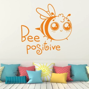 Naklejka na ścianę bee positive 2419 - Wzór graficzny. Grafika przedstawia uśmiechniętą pszczołę z dużymi oczami oraz napis