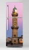 Okleina na lodówkę naklejka latarnia morska P1022 - Wzór graficzny. Grafika przedstawia latarnię morską na tle różowego
