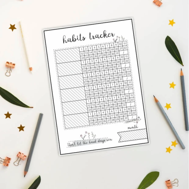 Tablica suchościeralna habits tracker 463 - Wzór graficzny. Prosta siatka z numerami dni, ozdobiona roślinnymi motywami