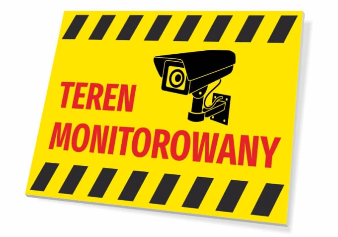 Tabliczka Teren monitorowany T012 - Wzór graficzny. Żółte tło, czarny piktogram kamery i czerwony tekst