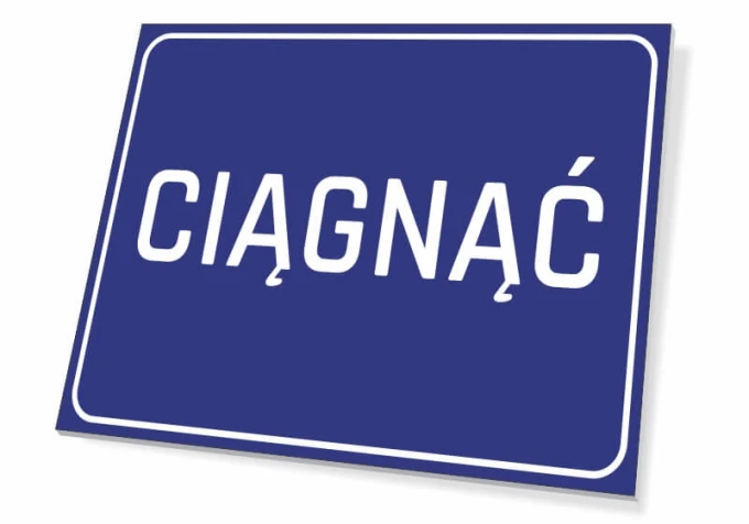 Tabliczka ciągnąć - Wzór graficzny. Prosty prostokąt z niebieskim tłem i białym napisem CIĄGNĄĆ
