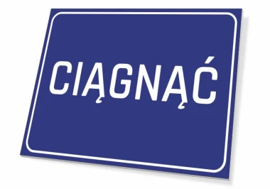Tabliczka ciągnąć - Wzór graficzny. Prosty prostokąt z niebieskim tłem i białym napisem CIĄGNĄĆ