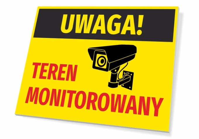 Tabliczka Uwaga teren monitorowany - Wzór graficzny. Żółte tło z czarnym napisem i ikoną kamery