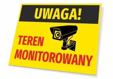 Tabliczka Uwaga teren monitorowany - Wzór graficzny. Żółte tło z czarnym napisem i ikoną kamery
