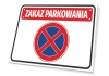 Tabliczka Zakaz parkowania T039 - Wzór graficzny. Czerwony napis na białym tle z niebieskim okręgiem i czerwoną krzyżującą