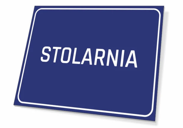 Niebieska tabliczka informacyjna na drzwi lub ścianę z białym napisem STOLARNIA i ramką na białym tle