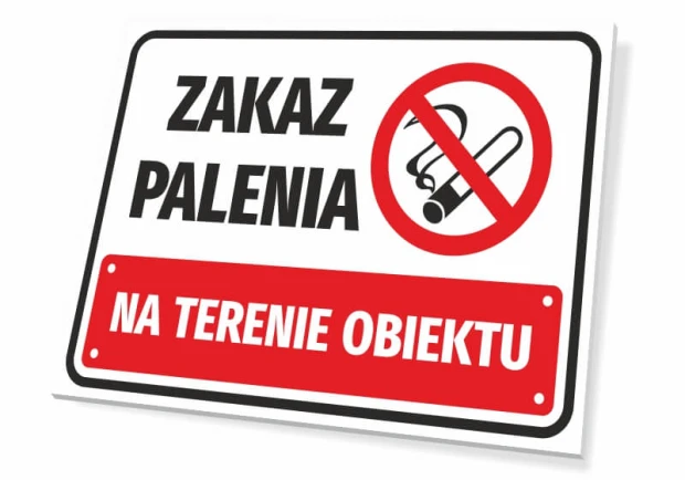 Tabliczka Zakaz palenia na terenie obiektu - Wzór graficzny. Na białym tle czerwony napis Zakaz palenia oraz symbol