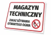 Tabliczka Magazyn techniczny - zakaz używania otwartego ognia - Wzór graficzny. Prostokątna tabliczka z białym tłem, czarnym