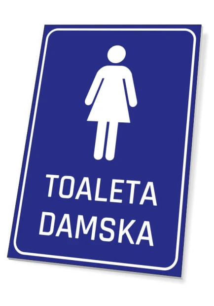 Niebieska prostokątna tabliczka informacyjna na drzwi z białym piktogramem kobiety i napisem TOALETA DAMSKA