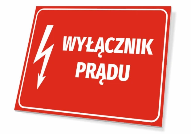 Czerwona tabliczka BHP z białym piktogramem błyskawicy i napisem Wyłącznik prądu, pokazana pod kątem na białym tle