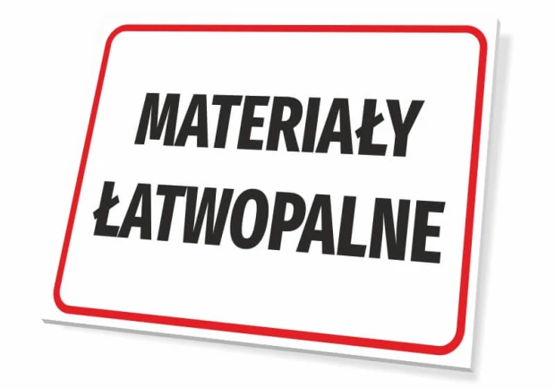 Tabliczka BHP z czarnym napisem MATERIAŁY ŁATWOPALNE w czerwonej ramce na białym tle, widok pod kątem