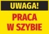 Naklejka Uwaga Praca w szybie - Wzór graficzny. Żółte tło z czarnym napisem UWAGA! i czerwonym PRACA W SZYBIE