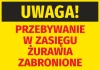 Naklejka Uwaga Przebywanie w zasięgu żurawia zabronione - Wzór graficzny. Żółte tło z czarnym i czerwonym tekstem