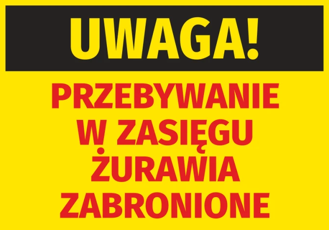 Naklejka Uwaga Przebywanie w zasięgu żurawia zabronione - Wzór graficzny. Żółte tło z czarnym i czerwonym tekstem