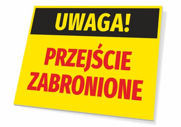 Żółta ostrzegawcza tabliczka BHP z czarnym pasem i czerwonym napisem UWAGA! PRZEJŚCIE ZABRONIONE na białym tle