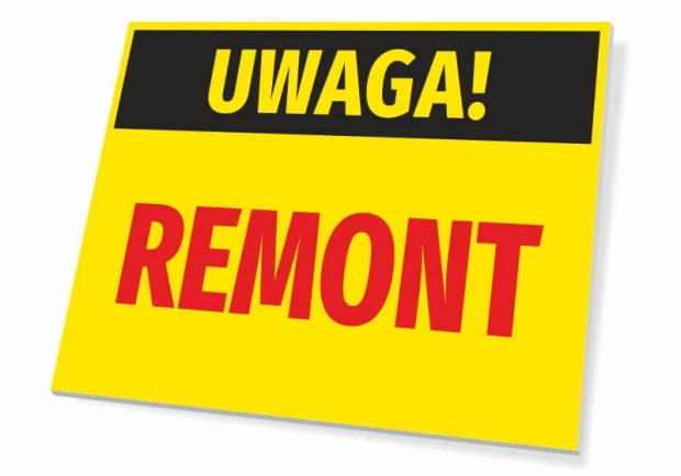 Żółta ostrzegawcza tabliczka BHP na białym tle z czarnym pasem i napisami UWAGA! REMONT
