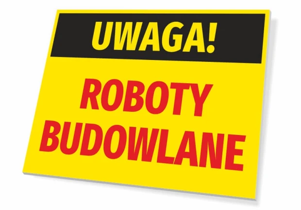 Żółta tabliczka ostrzegawcza BHP na białym tle z czarnym pasem i czerwonym napisem UWAGA! ROBOTY BUDOWLANE