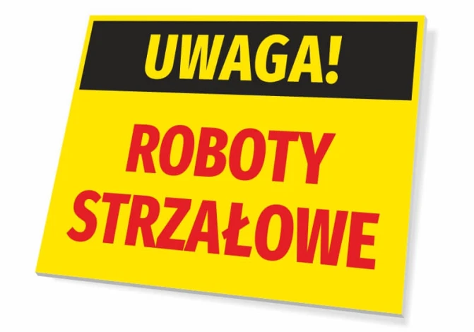 Tabliczka Uwaga Roboty strzałowe - Wzór graficzny. Żółte tło z czarnym napisem Uwaga i czerwonymi literami Roboty Strzałowe