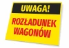 Tabliczka Uwaga Rozładunek wagonów - Wzór graficzny. Tło żółte, napis czarny i czerwony, prostokątna forma