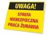 Tabliczka Uwaga Strefa niebezpieczna - praca żurawia - Wzór graficzny. Prostokątna tabliczka z żółtym tłem i czarnym napisem