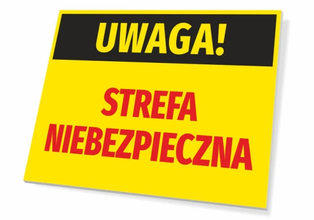 Żółta tabliczka ostrzegawcza BHP z czarnym pasem i czerwonym napisem UWAGA! STREFA NIEBEZPIECZNA