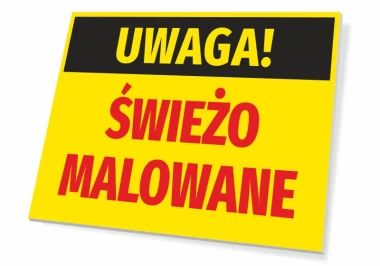 Tabliczka Uwaga Świeżo malowane - Wzór graficzny. Prostokątna tabliczka z żółtym tłem, czarnym napisem u góry i czerwonym