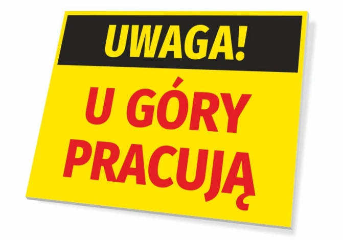 Tabliczka Uwaga U góry pracują - Wzór graficzny. Żółte tło z czarnym napisem UWAGA! i czerwonym U GÓRY PRACUJĄ