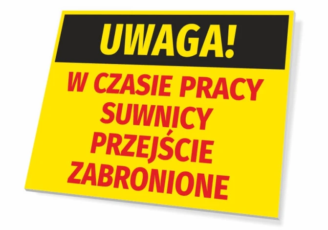 Tabliczka Uwaga W czasie pracy suwnicy przejście zabronione - Wzór graficzny. Żółte tło z czarnym i czerwonym tekstem