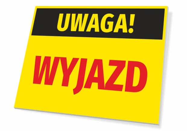 Żółta ostrzegawcza tabliczka z napisem UWAGA! WYJAZD na białym tle, pokazująca grubość płyty pod kątem