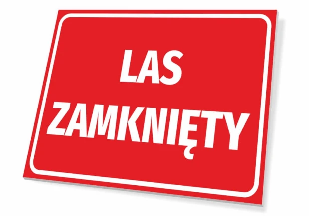 Czerwona tabliczka informacyjna z białym napisem LAS ZAMKNIĘTY i ramką, pokazująca grubość płyty