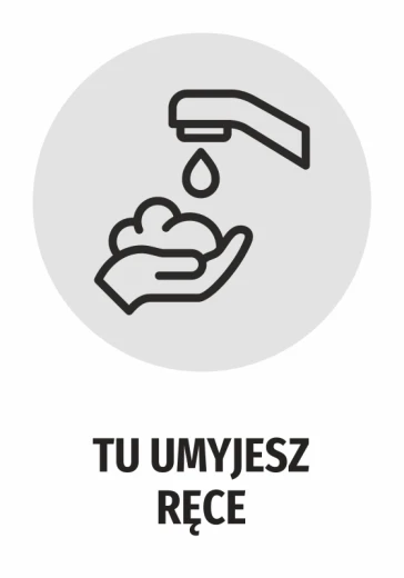 Okrągła szara naklejka BHP z czarnym piktogramem mycia rąk pod kranem i napisem Tu umyjesz ręce na białym tle