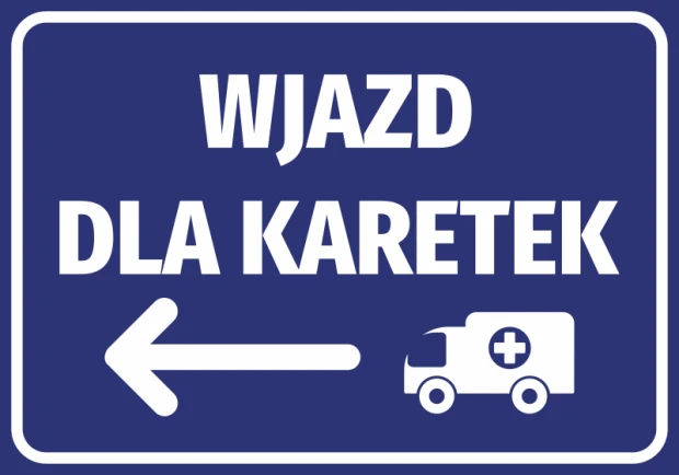 Niebieska naklejka informacyjna z białym napisem Wjazd dla karetek, strzałką w lewo i piktogramem ambulansu
