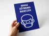 Tabliczka Nakaz używania maseczek - Wzór graficzny. Niebieskie tło z białym napisem i piktogramem twarzy w maseczce