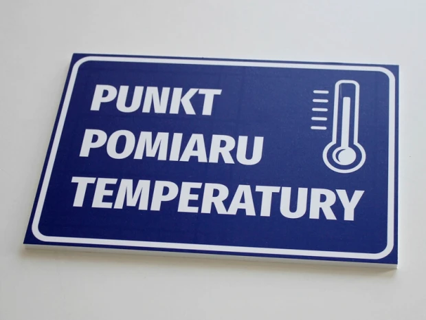 Tabliczka Punkt pomiaru temperatury - Wzór graficzny. Prosta grafika z białym tekstem na niebieskim tle