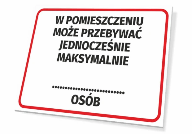Biała tabliczka BHP z czerwoną ramką i napisem W pomieszczeniu może przebywać jednocześnie maksymalnie... osób