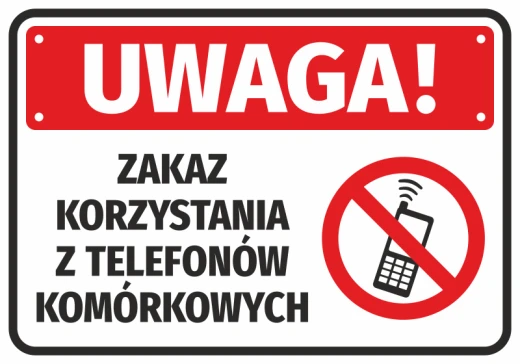Naklejka BHP na białym tle z czerwonym napisem UWAGA oraz piktogramem zakazu używania telefonów komórkowych