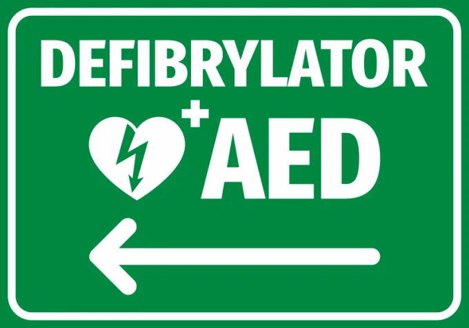 Naklejka Defibrylator AED N561 - Wzór graficzny. Zielone tło z białym napisem i symbolem serca z błyskawicą