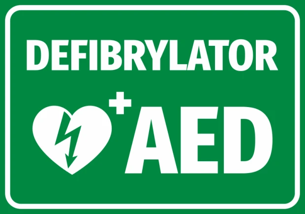 Naklejka Defibrylator AED N562 - Wzór graficzny. Zielone tło z białym napisem i symbolem serca z błyskawicą
