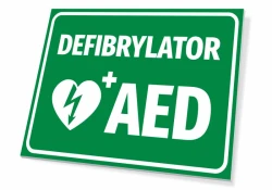 Tabliczka Defibrylator AED T562 - Wzór graficzny. Zielone tło z białym napisem i symbolem serca z błyskawicą