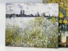 Reprodukcja Ile aux Fleurs near Vetheuil, Claude Monet - Wzór graficzny. Obraz przedstawia kwiaty na pierwszym planie