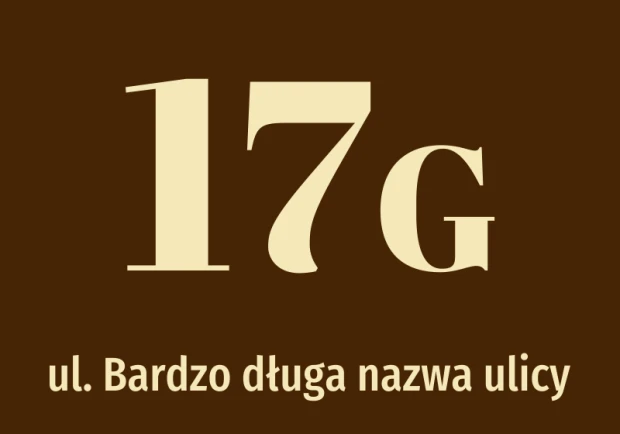 Naklejka adresowa na brązowym tle z przykładowym numerem i literą oraz miejscem na długą nazwę ulicy